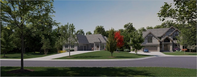 view of front of home featuring a garage and a front yard