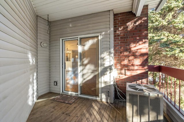 wooden deck featuring central AC