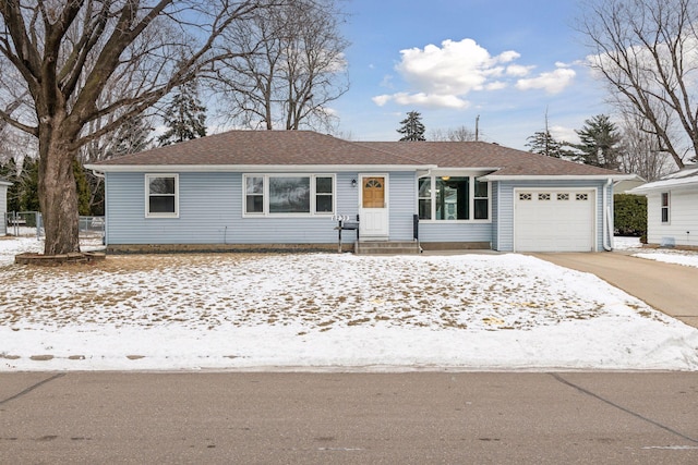 ranch-style home featuring a garage