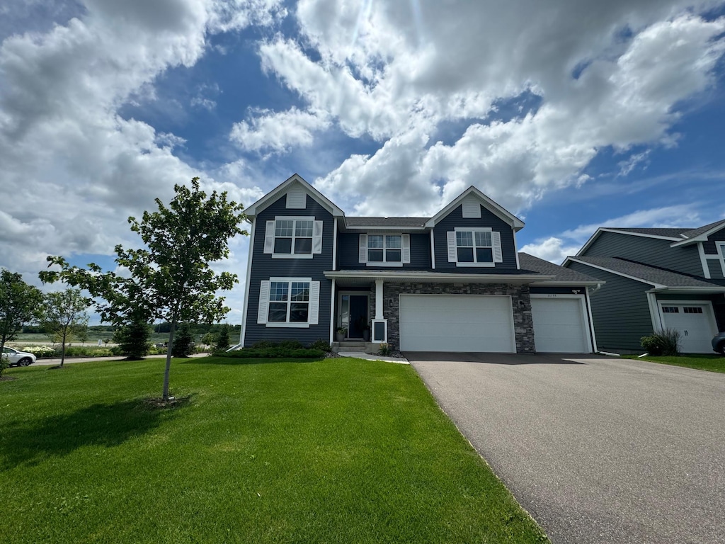 view of front of home with a front lawn