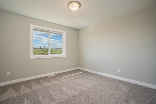 empty room with carpet floors