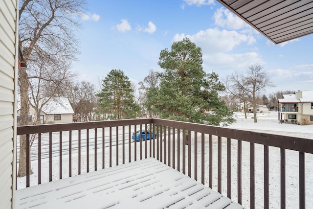 view of snow covered deck