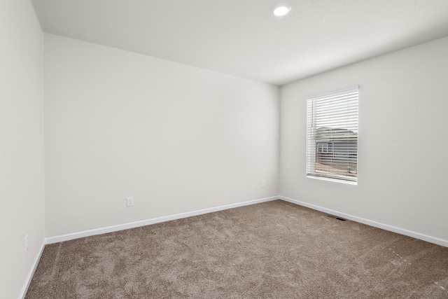 view of carpeted spare room