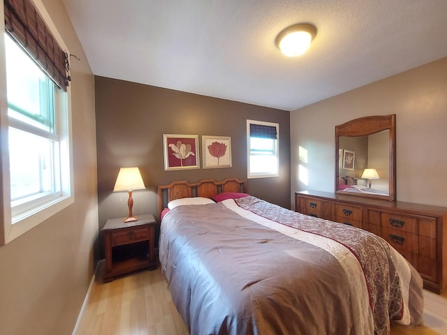 bedroom featuring light hardwood / wood-style flooring