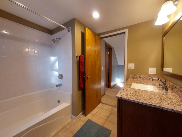 bathroom featuring vanity, tile patterned floors, and shower / washtub combination