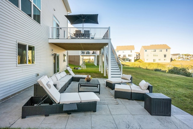 view of patio featuring a balcony and an outdoor hangout area