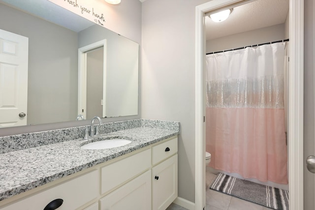 full bath featuring toilet, curtained shower, tile patterned flooring, and vanity