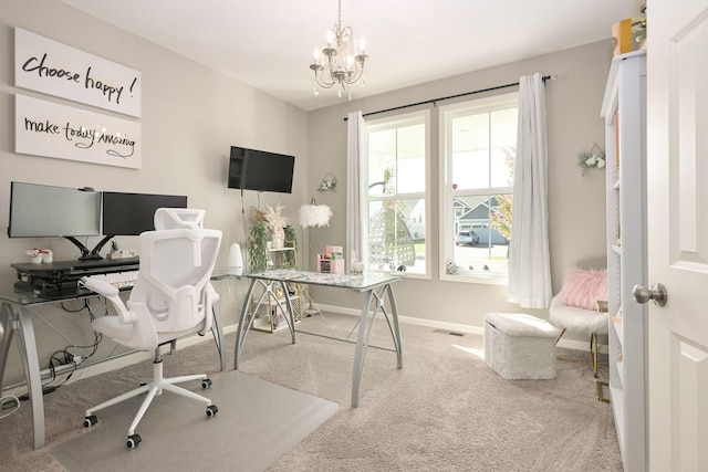 carpeted home office featuring a chandelier, visible vents, and baseboards