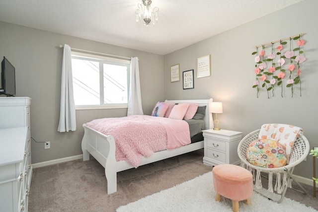 bedroom featuring baseboards and light colored carpet