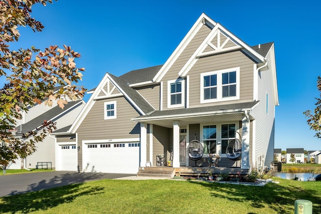 view of front of house featuring an attached garage, covered porch, central AC, driveway, and a front lawn