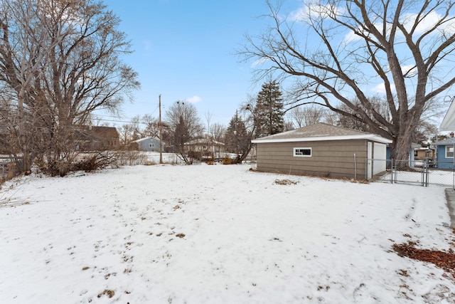 view of yard layered in snow