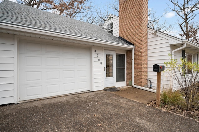 property entrance featuring a garage