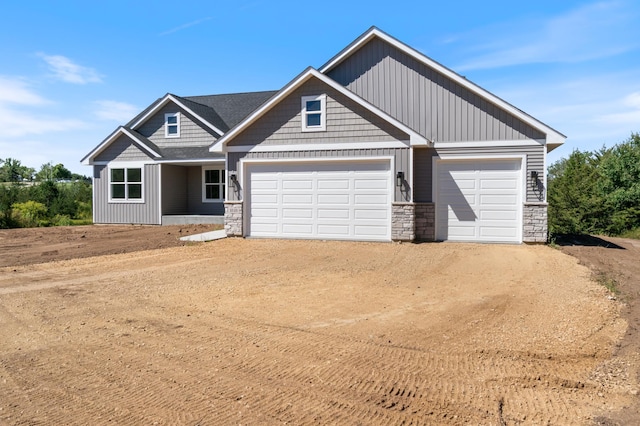 craftsman-style house featuring a garage