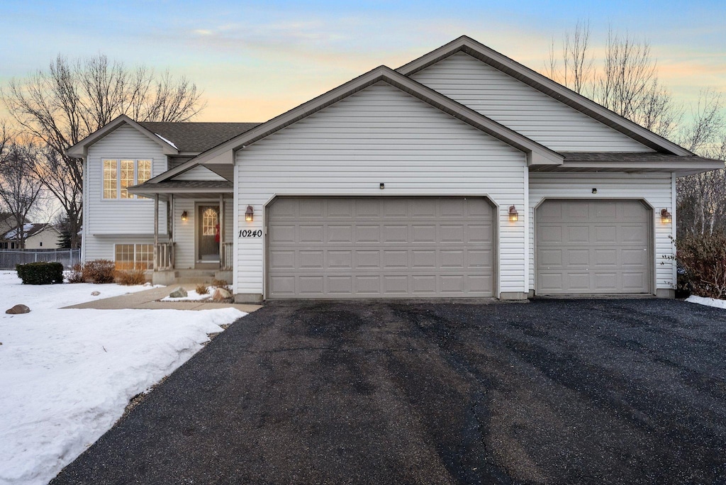 view of front of property featuring a garage