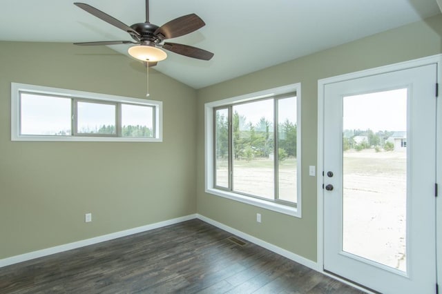 entryway with lofted ceiling, ceiling fan, and dark hardwood / wood-style floors