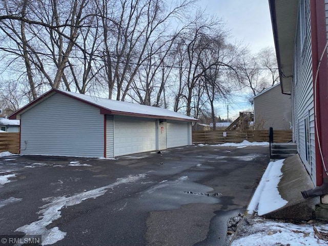 view of snow covered garage