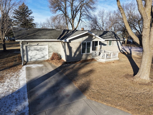 view of side of property featuring a garage