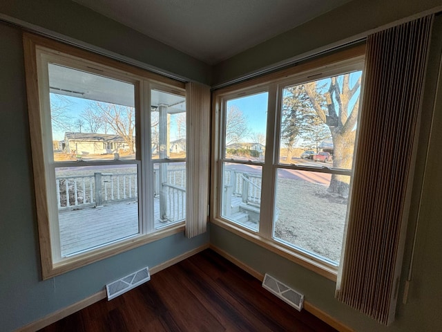 interior space with hardwood / wood-style flooring