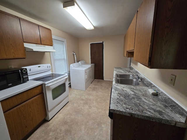 kitchen with washer and dryer, white electric range, and sink