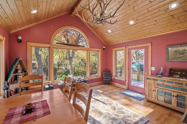 dining area featuring healthy amount of natural light, wood finished floors, lofted ceiling, recessed lighting, and wood ceiling
