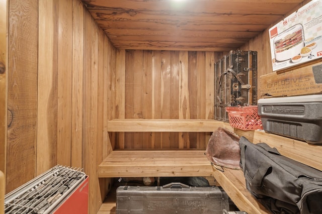 relaxing sauna / steam room with wooden walls and wood ceiling