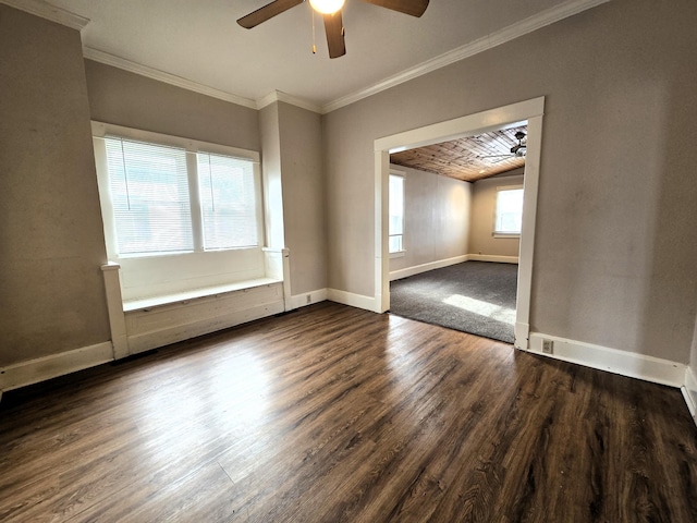 unfurnished room with ceiling fan, crown molding, and dark hardwood / wood-style floors