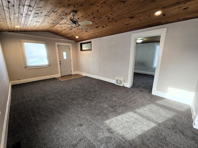 foyer with lofted ceiling, ceiling fan, wood ceiling, and dark carpet