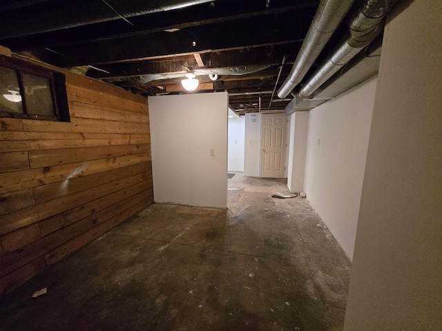 basement with wooden walls