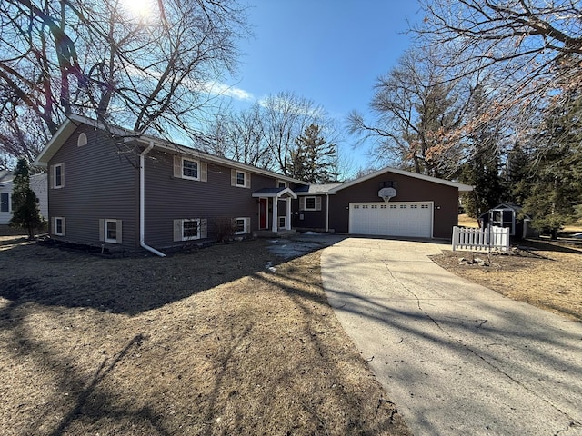 view of front facade featuring a garage and concrete driveway