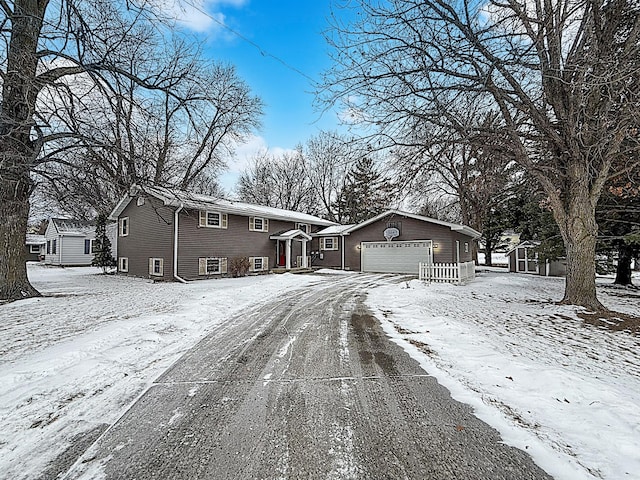 619 10th St, Montevideo, MN 56265 - view of front of home with driveway and an attached garage