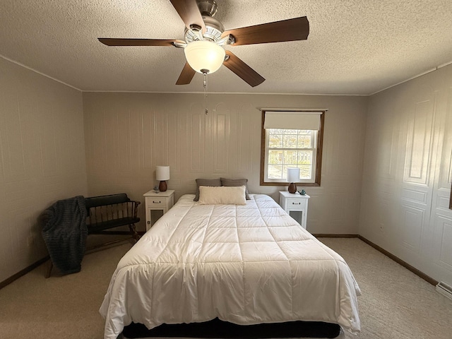 619 10th St, Montevideo, MN 56265 - bedroom with light colored carpet, a textured ceiling, ceiling fan, and baseboards