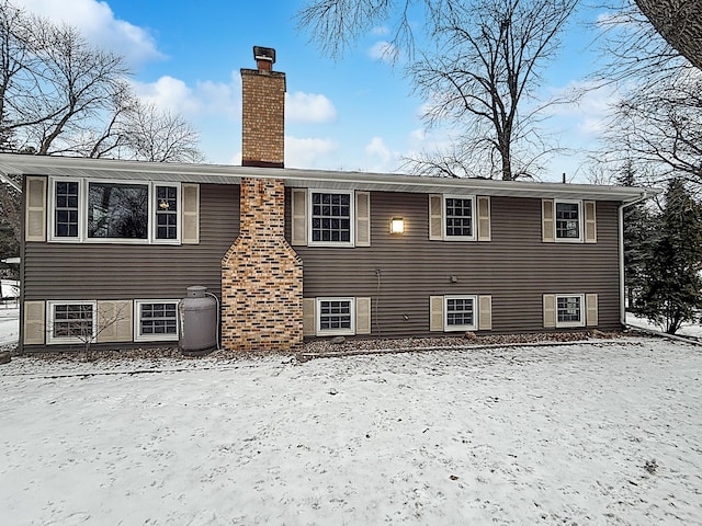 619 10th St, Montevideo, MN 56265 - view of side of property with a chimney