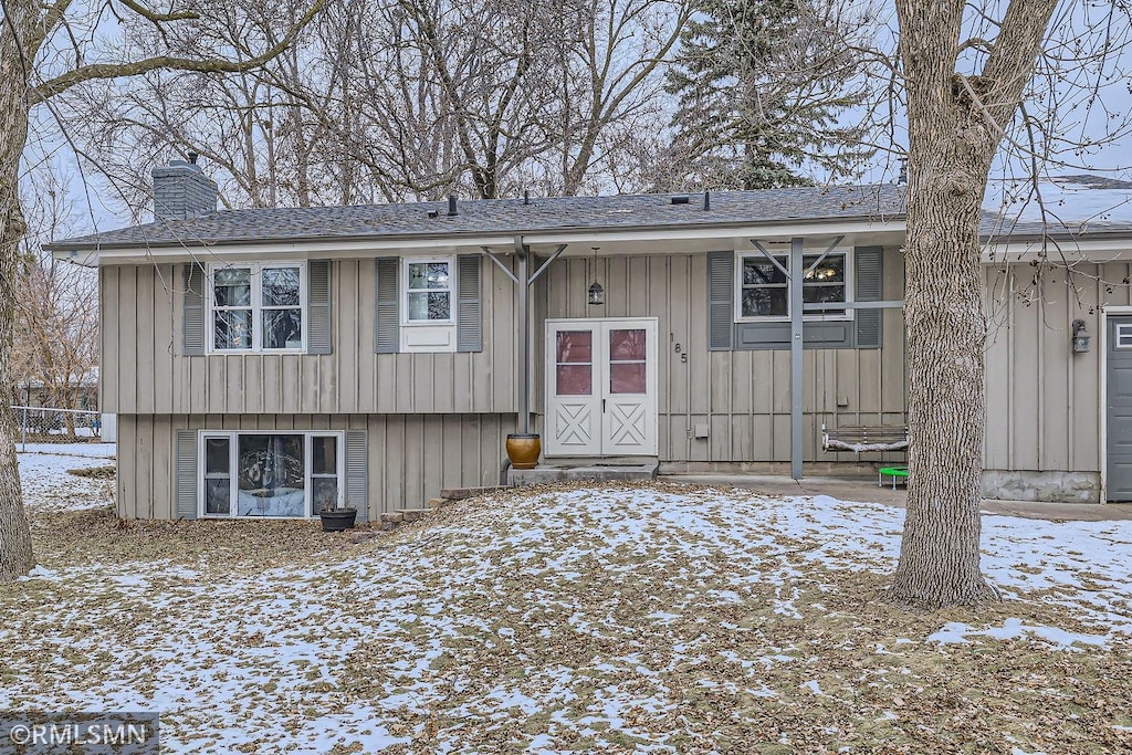 view of snow covered property