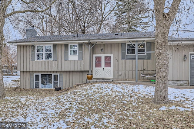 view of snow covered property