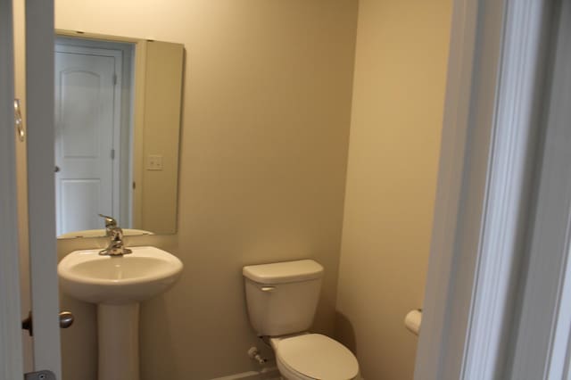 bathroom featuring toilet