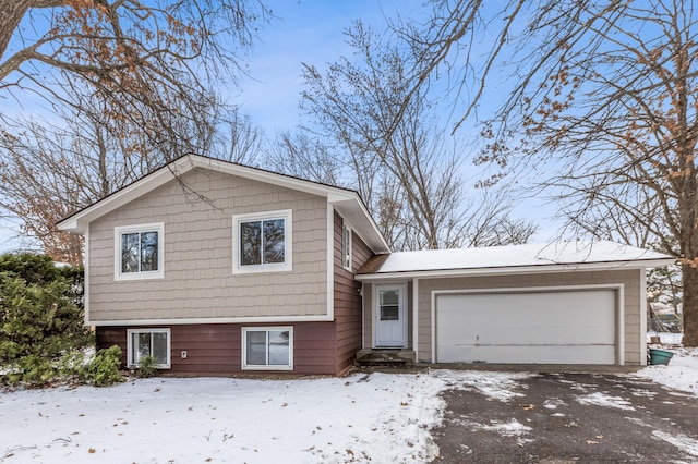 split level home with a garage