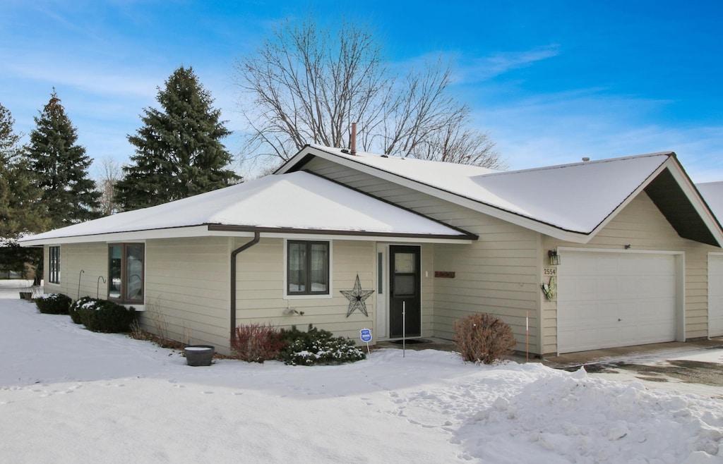 ranch-style home with a garage