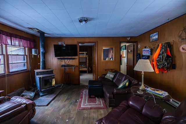 23790 360th St, Huntersville Twp, MN 56464 - living room with hardwood / wood-style flooring, wooden walls, and a wood stove