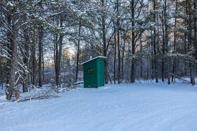 23790 360th St, Huntersville Twp, MN 56464 - yard layered in snow featuring a storage shed