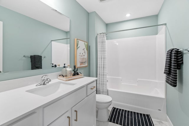 full bathroom with shower / bath combo with shower curtain, toilet, and vanity