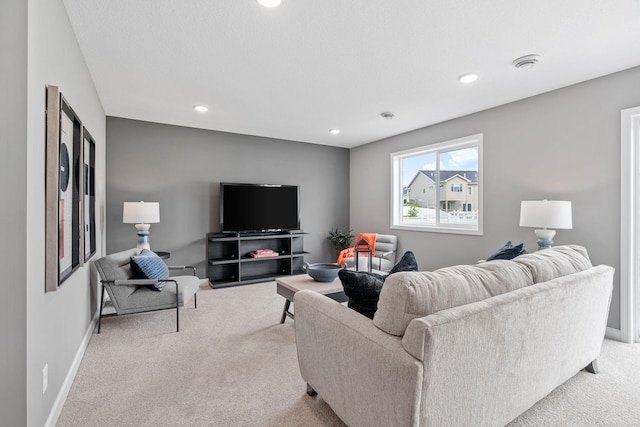 living room featuring light colored carpet