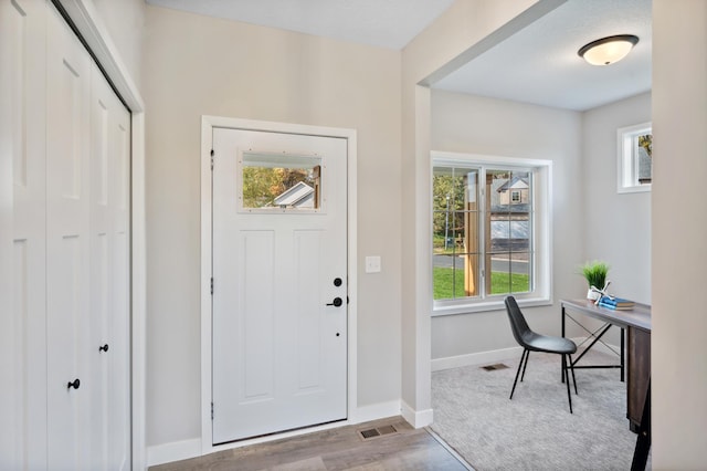 foyer featuring light hardwood / wood-style floors