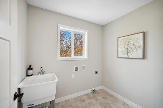 laundry room with washer hookup, sink, and hookup for an electric dryer