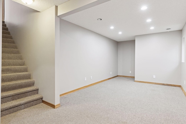 basement with light carpet