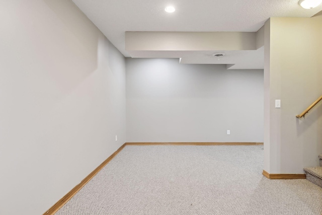 basement featuring carpet flooring