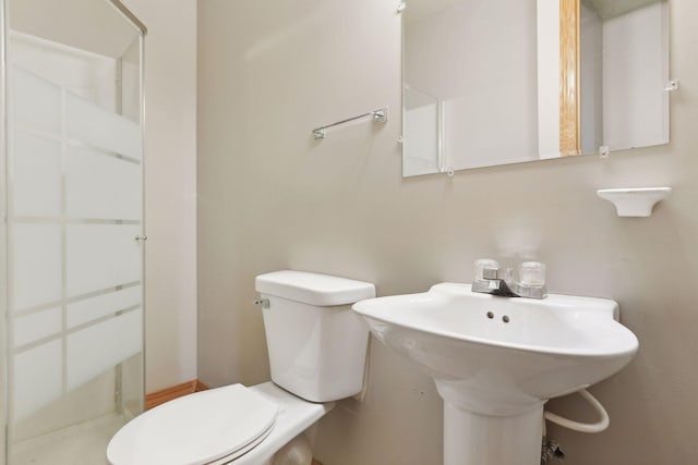 bathroom with sink and toilet