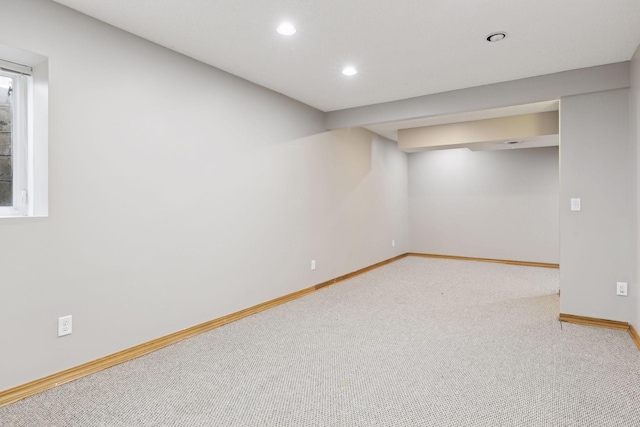 basement featuring carpet flooring