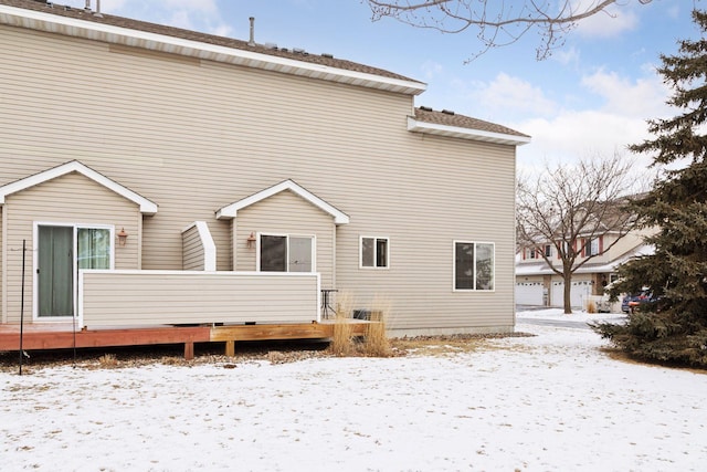 view of snow covered property