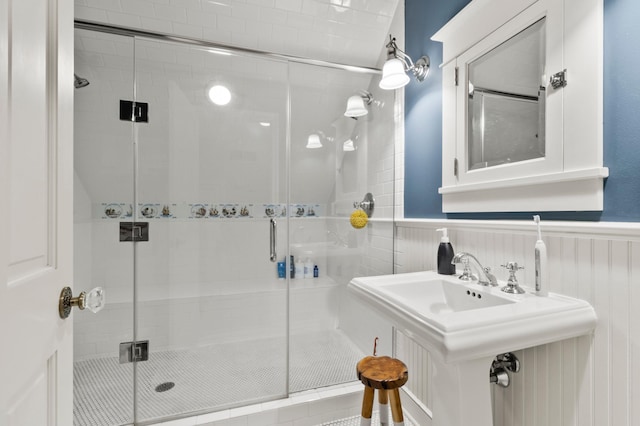 bathroom with sink and walk in shower