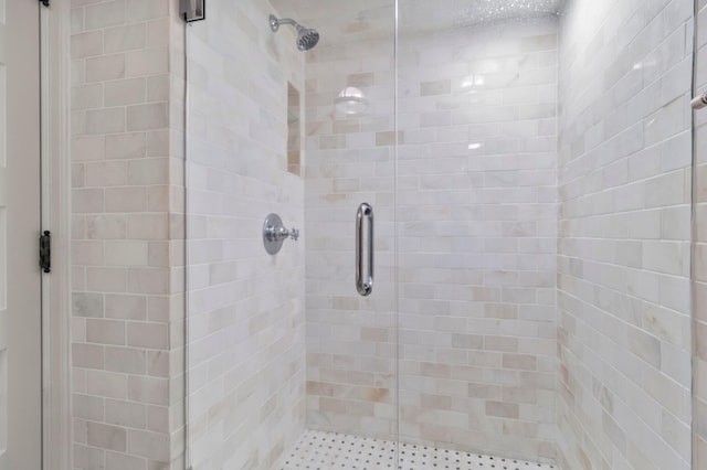 bathroom featuring walk in shower